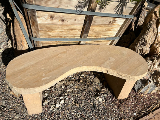 Custom three-piece flagstone kidney bench with curved stone seat