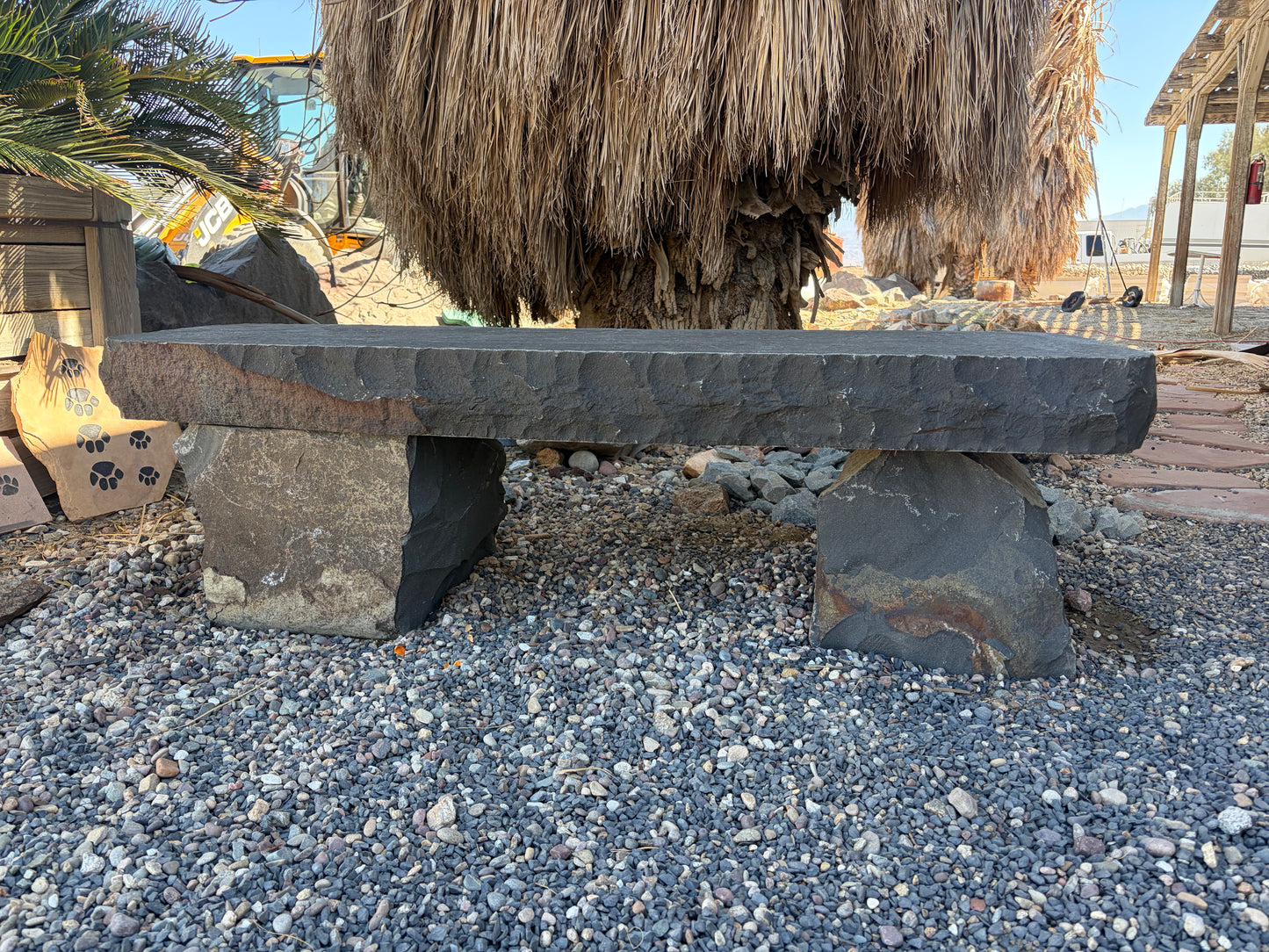 Basalt Flintstone Bench made from natural dark volcanic stone for outdoor landscaping